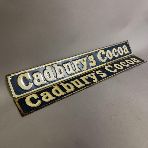 66 - A pair of Cadbury’s Cocoa painted tin advertising signs.