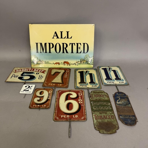 67 - A collection of nine painted tin grocery price tags and advertising signs, including two match strik... 