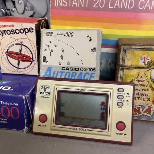 75 - A Paillard Bolex Super 8 projector, along with a Nintendo Game and Watch Chef, a Casio Autorace, A C... 