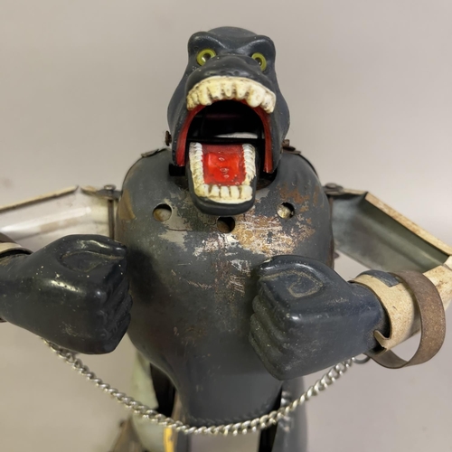 77 - A 1960s Louis Marx Toys ‘The Mighty Kong’ clockwork model with permanent key and original shackles a... 