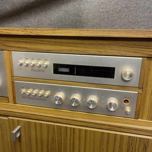 20 - A vintage 1970s hifi system in a custom built cabinet, comprising a Metrosound Plus ST20 Amplifier, ... 