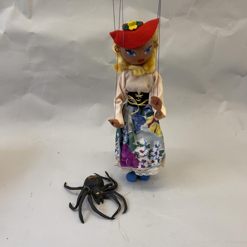 89 - An early pair of boxed Pelham Puppets comprising of The Minstrel and Mitzi, along with a spider.