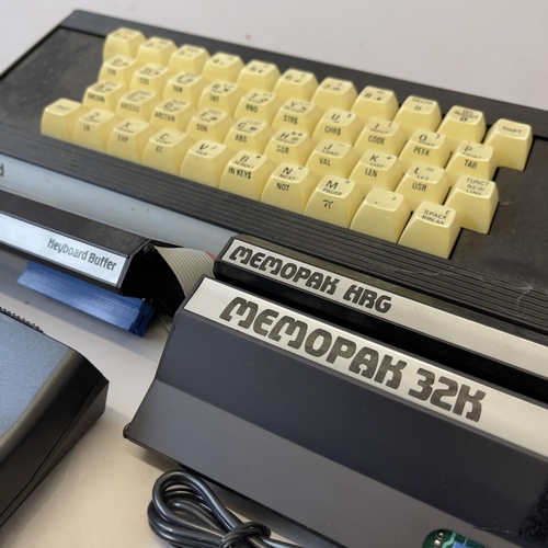 92 - A Sinclair ZX81 home computer, complete with Memopak Keyboard, Memopak memory expansion modules and ... 