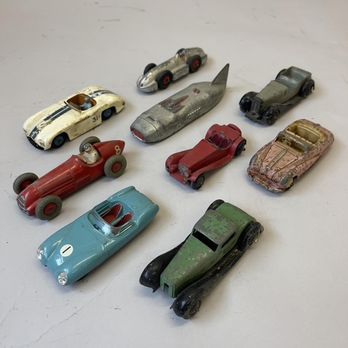 95 - A collection of die cast cars, including a Dinky Cunningham C5R, a Dinky Thunderbolt, A Dinky Speed ... 