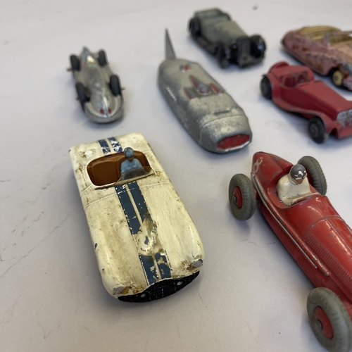 95 - A collection of die cast cars, including a Dinky Cunningham C5R, a Dinky Thunderbolt, A Dinky Speed ... 