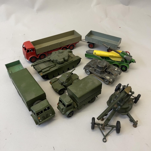 96 - A collection of die cast military models including a Dinky 651 Centurion Tank, a Dinky 622 Ten Ton T... 