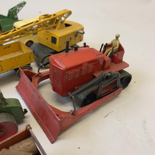 97 - A collection of die cast service vehicles, including a boxed Dinky 562 Dumper Truck, a Dinky Blaw Kn... 