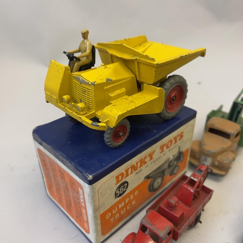 97 - A collection of die cast service vehicles, including a boxed Dinky 562 Dumper Truck, a Dinky Blaw Kn... 