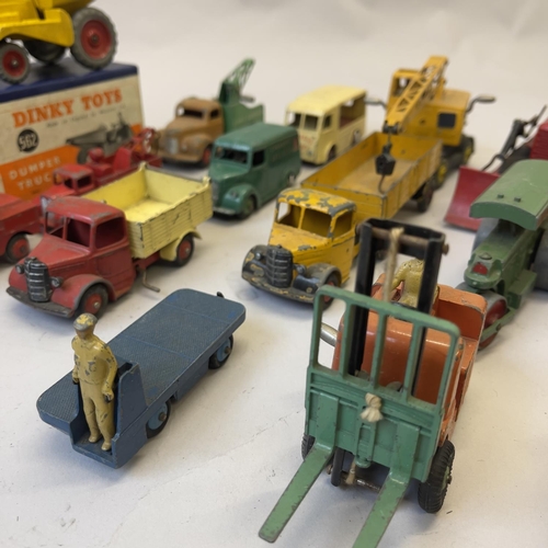 97 - A collection of die cast service vehicles, including a boxed Dinky 562 Dumper Truck, a Dinky Blaw Kn... 