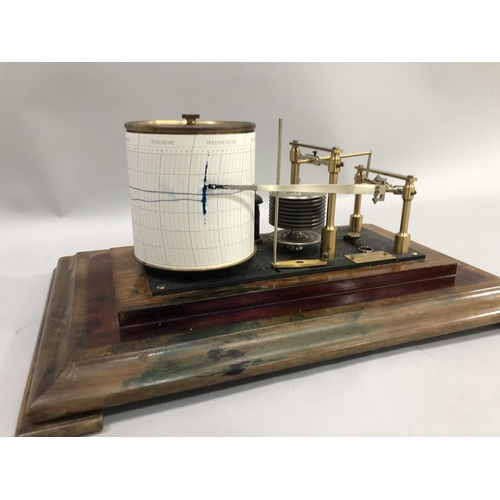 138 - A Negretti and Zambra oak cased barograph, 20th century serial no. R/39620, 38cm high