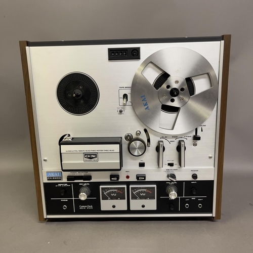 41 - A Philips Hi-Z three-speed automatic record player in veneered case. Untested.