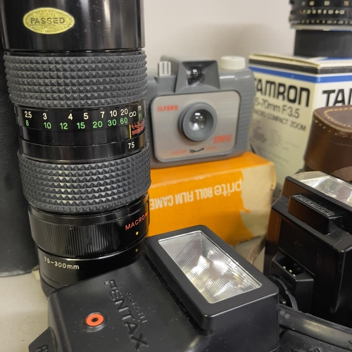 46 - A Pentax ME Super manual SLR camera along with a Tamron 35-70mm lens, a Hanimex 75-300mm lens, an Il... 