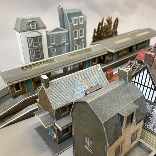 6 - An extensive collection of 00 gauge plastic, card and cast-metal trackside buildings and accessories... 