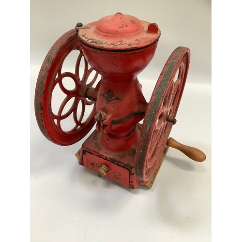 294 - Red double wheel cast iron coffee mill with hand crank, marked Stowmarket Suffolk, Iron Foundry 1920... 