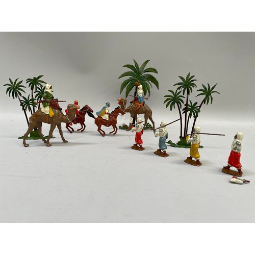 62 - A Britains lead Arabs in the Desert group including three palm trees, two riflemen on camel back, tw... 