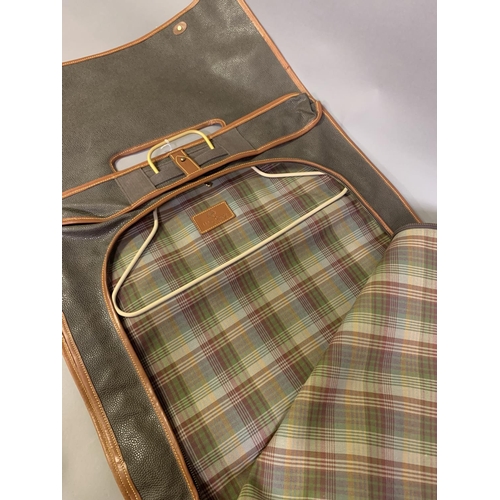 151 - Mulberry: a dark olive/brown scotch grain leather suit carrier/ garment bag, trimmed with tan leathe... 