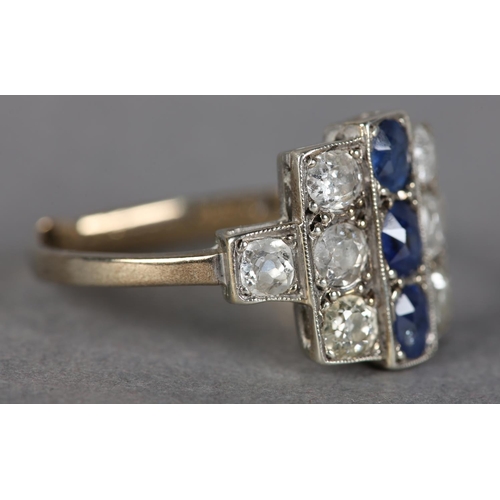 184 - AN ART DECO SAPPHIRE AND DIAMOND CLUSTER RING in platinum set to the centre with three oval faceted ... 