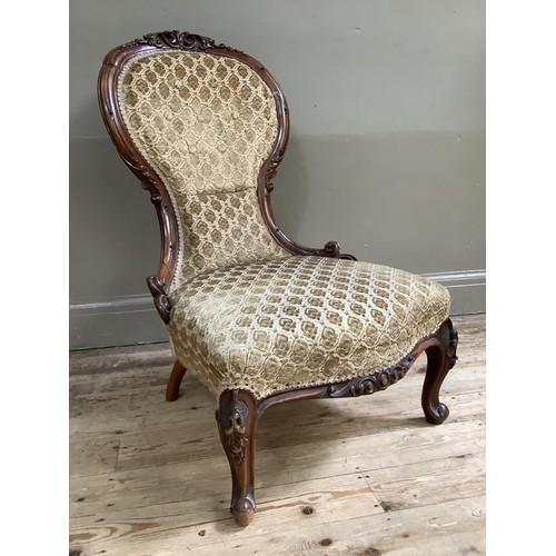 185 - 19th century mahogany nursing chair with carved foliate crest and frame on cabriole legs upholstered... 