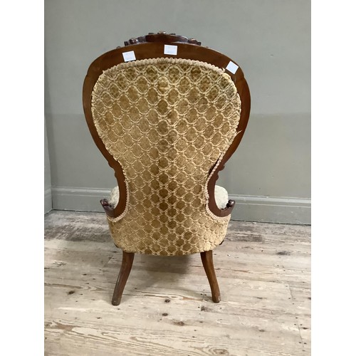 185 - 19th century mahogany nursing chair with carved foliate crest and frame on cabriole legs upholstered... 