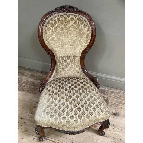 185 - 19th century mahogany nursing chair with carved foliate crest and frame on cabriole legs upholstered... 