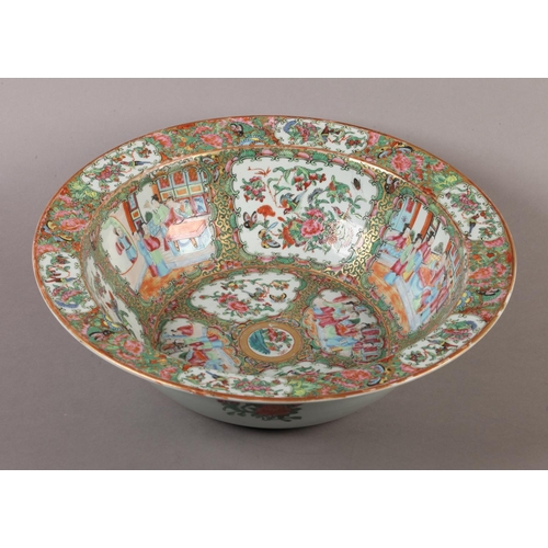 117 - A CHINESE FAMILLE ROSE PUNCH BOWL, 19th century, painted with figures on a terrace and with peony, f... 