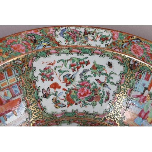 117 - A CHINESE FAMILLE ROSE PUNCH BOWL, 19th century, painted with figures on a terrace and with peony, f... 