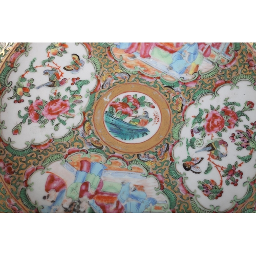 117 - A CHINESE FAMILLE ROSE PUNCH BOWL, 19th century, painted with figures on a terrace and with peony, f... 