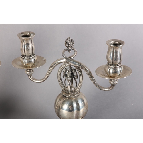 159 - A MATCHED PAIR OF DANISH SILVER CANDELABRA each of two lights, pomegranate pattern in the manner of ... 