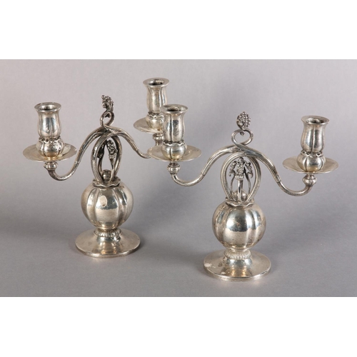 159 - A MATCHED PAIR OF DANISH SILVER CANDELABRA each of two lights, pomegranate pattern in the manner of ... 