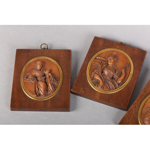 69 - A SET OF FOUR EARLY 17TH CENTURY FLEMISH DEVOTIONAL BOXWOOD MEDALLIONS, oval, finely carved in relie... 