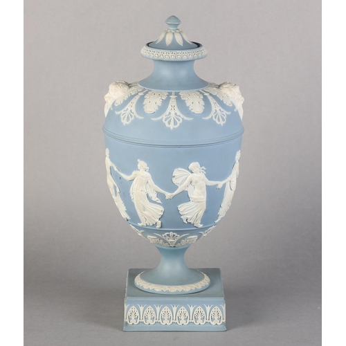 108 - A LARGE EARLY 19TH CENTURY WEDGWOOD JASPERWARE URN AND COVER, the pale blue body ornamented in white... 