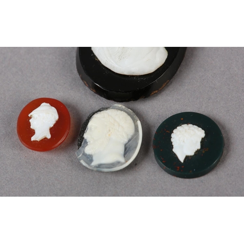 162 - A GROUP OF FOUR LATE 18TH AND EARLY 19TH CENTURY CAMEO DOUBLETS including a small oval white paste a... 