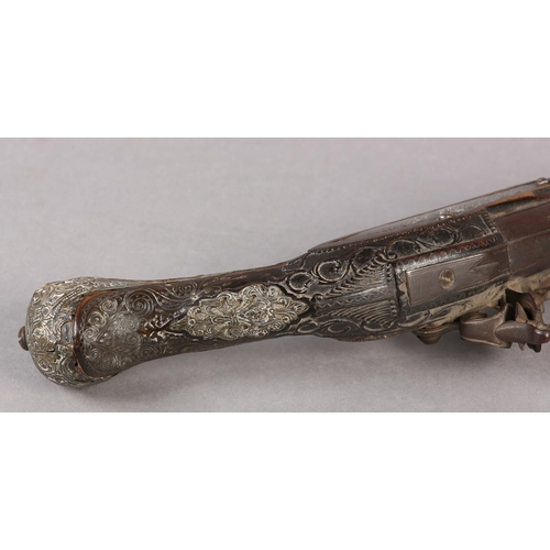 6 - A NINETEEN BORE OTTOMAN FLINTLOCK KUBER PISTOL C1800, tapering barrel with worn chiselled foliate sc... 