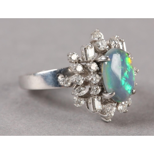 169 - A BLACK OPAL AND DIAMOND CLUSTER RING, the oval cabochon opal claw set and raised against a tiered s... 