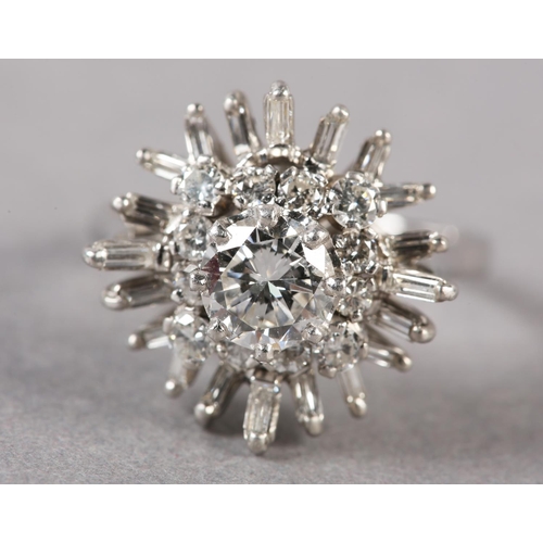 183 - A DIAMOND CLUSTER RING, the principal brilliant cut stone claw set and raised against undulating tie... 