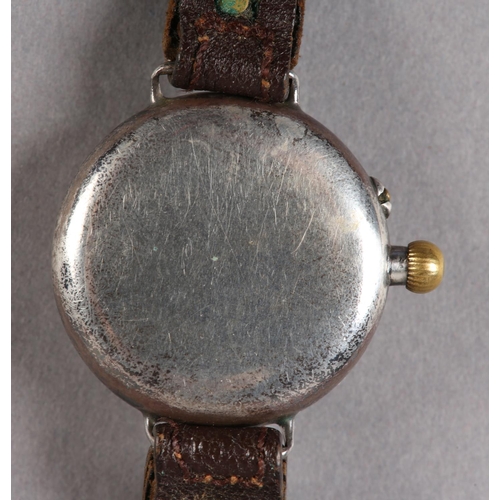 250 - A WWI ERA WRISTWATCH IN SILVER CASE NO 445346, Swiss jewelled lever movement, white enamel dial with... 