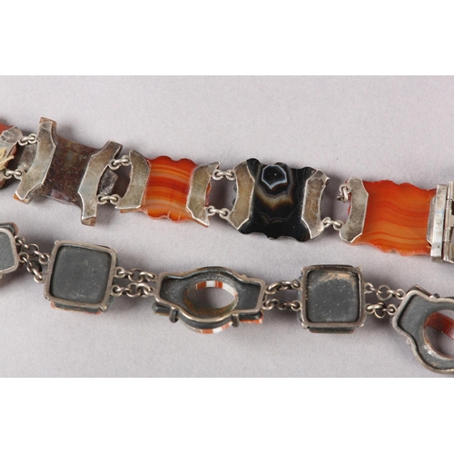 191 - A SCOTTISH PEBBLE silver bracelet, each link claw set with separate blood stone, moss on banded agat... 