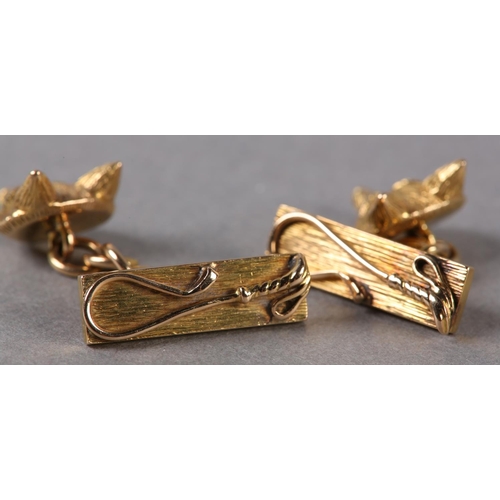 194 - A PAIR OF GEORGE V FOX MASK CUFFLINKS in 18ct gold, each half relief engraved mask set with ruby eye... 