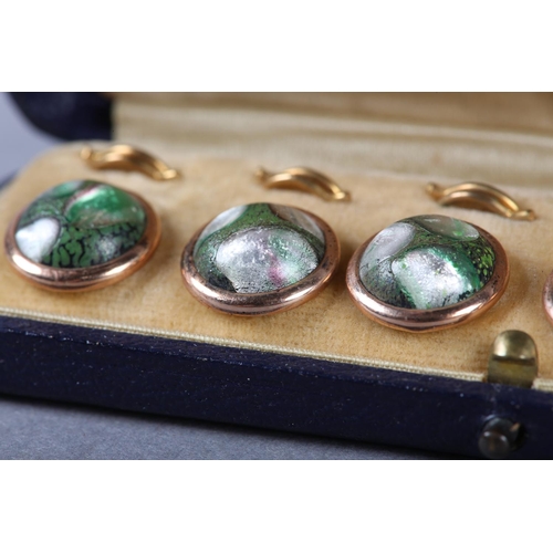 195 - A SET OF SIX VICTORIAN DRESS STUDS, each collet set with a circular cabochon green and iridescent pa... 