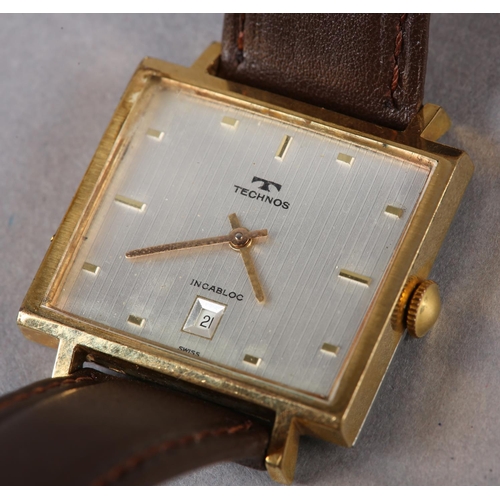 283 - A TECHNOS GENTLEMAN'S DRESS DATE WRISTWATCH, c1965, in a rectangular rolled gold case no 1073936, Sw... 