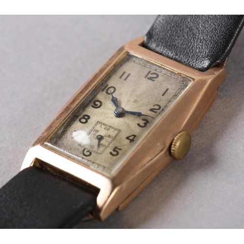 268 - A GENTLEMAN'S ART DECO DRESS WRISTWATCH, c1935, in 9ct rose gold, rectangular faceted case no 691601... 