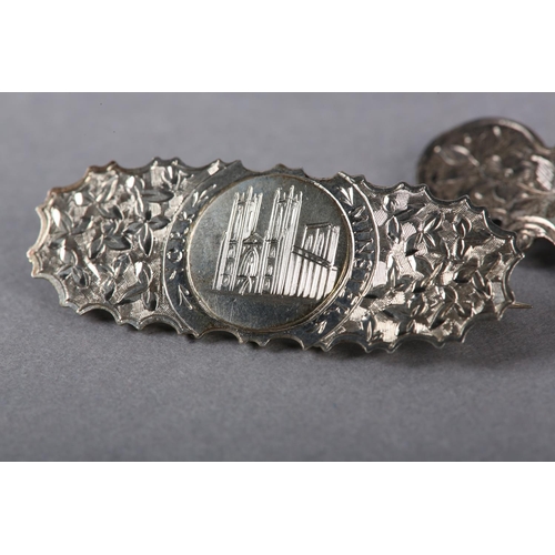 196 - A VICTORIAN SILVER BROOCH WITH AN IMAGE OF THE CRYSTAL PALACE in half relief applied to the scallope... 