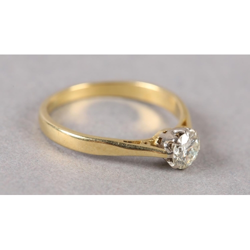 209 - A SINGLE STONE DIAMOND RING, the brilliant cut stone crown set in yellow and white metal (tests as 1... 