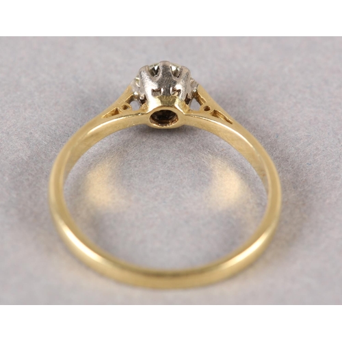 209 - A SINGLE STONE DIAMOND RING, the brilliant cut stone crown set in yellow and white metal (tests as 1... 