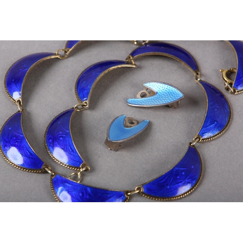 215 - A SCANDINAVIAN GUILLOCHE ENAMEL SILVER GILT NECKLACE C1960, each royal blue dished increscent with r... 