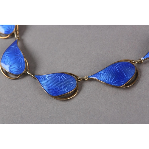 217 - A NORWEGIAN GUILLOCHE SILVER GILT NECKLACE BY IVAR T HOLTH, the pierced drop shaped blue links faste... 