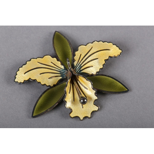 219 - A NORWEGIAN GUILLOCHE SILVER GILT ORCHID BROOCH BY AKSEL HOLMSEN, the petals in green and yellow ena... 