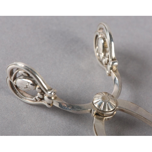 160 - GEORG JENSEN SILVER MAGNOLIA DESIGN SPRING ACTION SUGAR TONGS, London 1999 in original packaging, ap... 