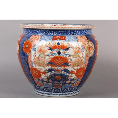 114 - A CHINESE IMARI JARDINIERE, the lobed body painted with alternating panels of scrollwork, diaper cel... 