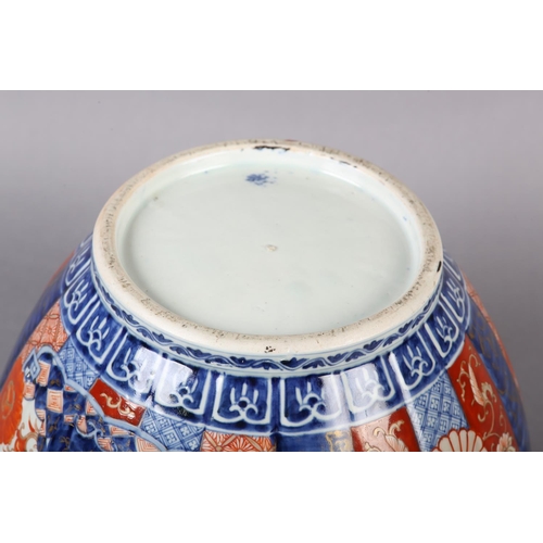 114 - A CHINESE IMARI JARDINIERE, the lobed body painted with alternating panels of scrollwork, diaper cel... 